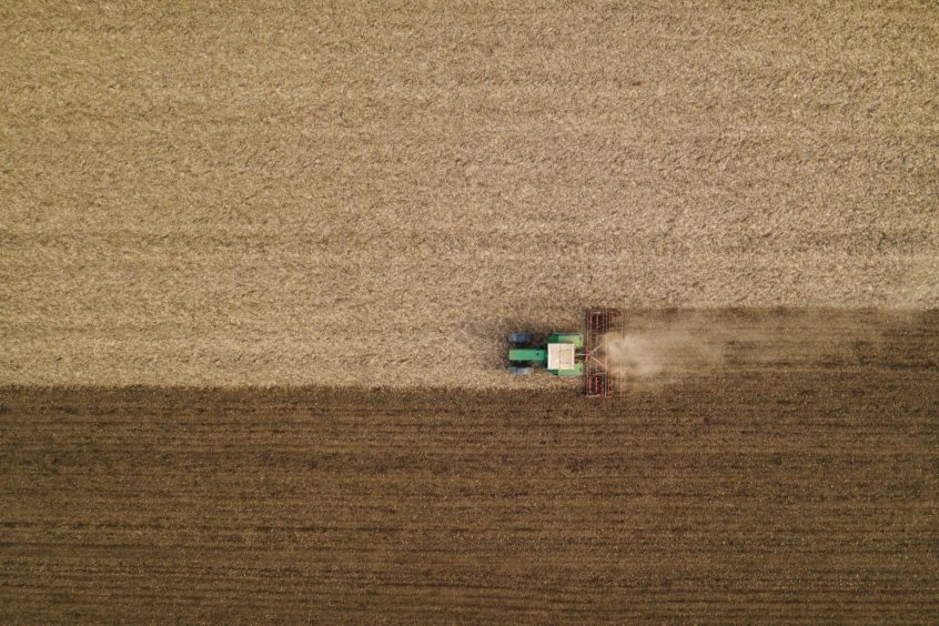 sky view of tractor in field
